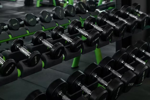 O2 Gym dumbbells arranged on the training floor